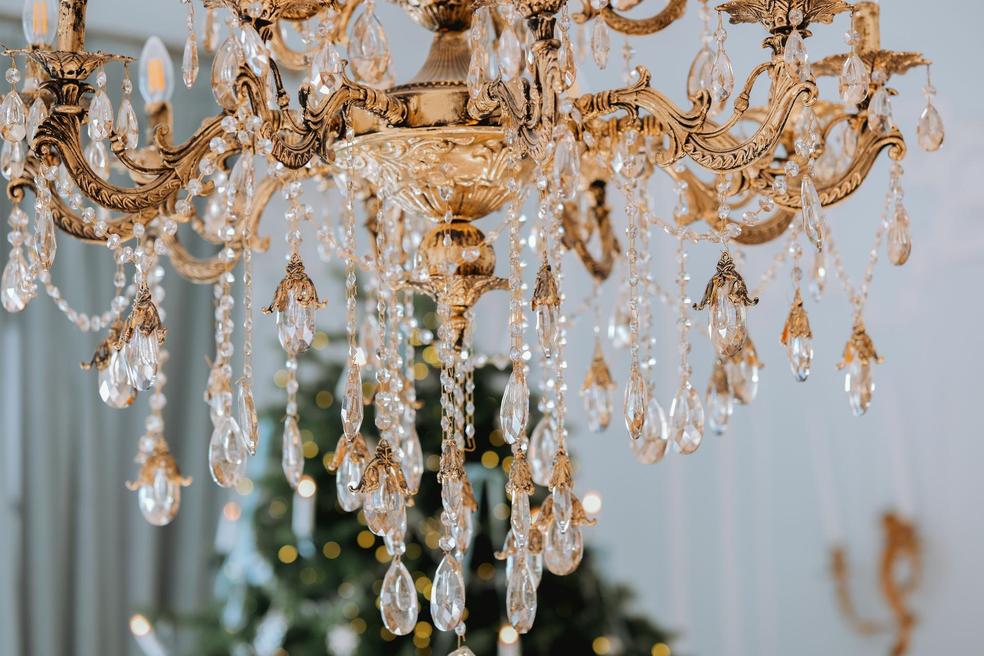 Elegant chandelier adorned with crystals illuminating a festive setting