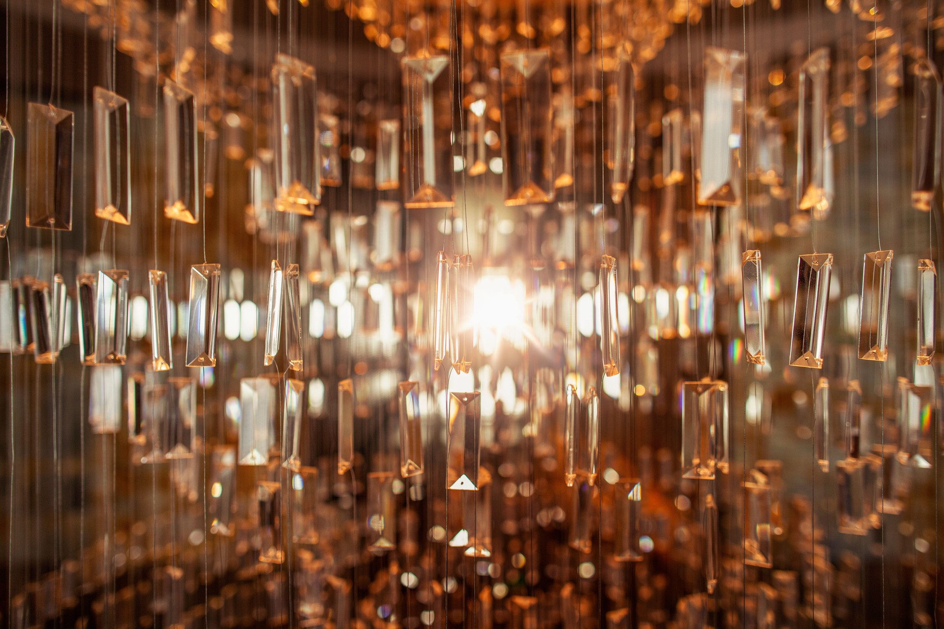 Elegant luxurious glass chandelier hanging from ceiling