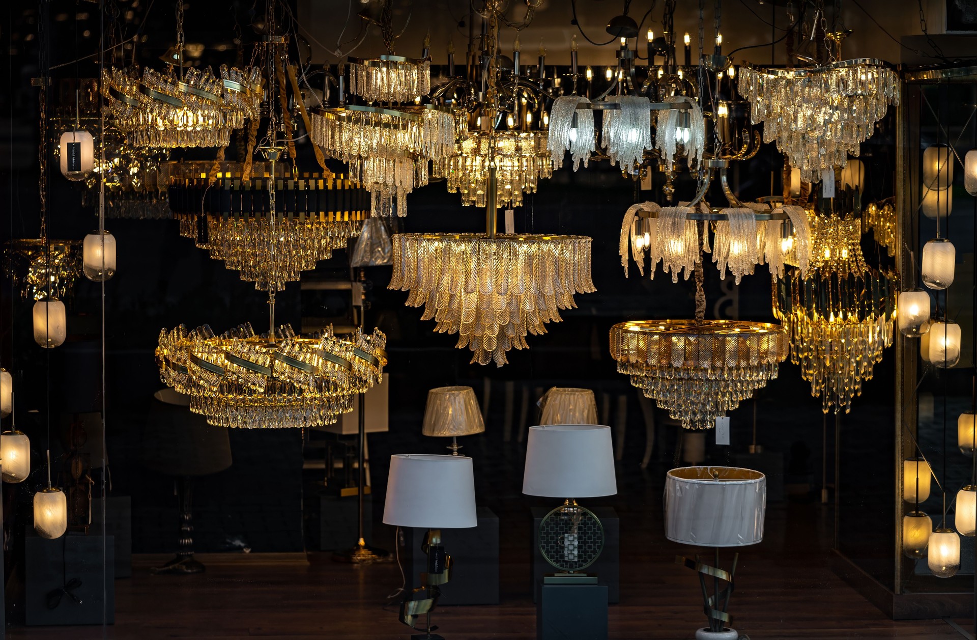 Shop windows and light fixture. Lamp Store exterior. Front View from street outdoor. LED light Chandelies.